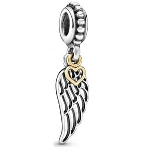 Pandora two tone angel feather charm with 14k gold heart